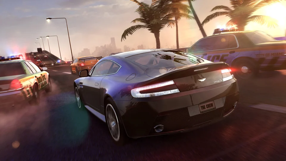 Official gameplay screenshot from The Crew showing cars racing through its online open world
