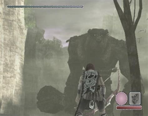 Wander facing a towering colossus in Shadow of the Colossus