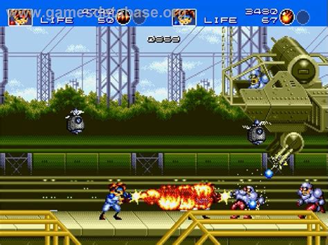 Gunstar Heroes action scene with colorful enemies and projectiles